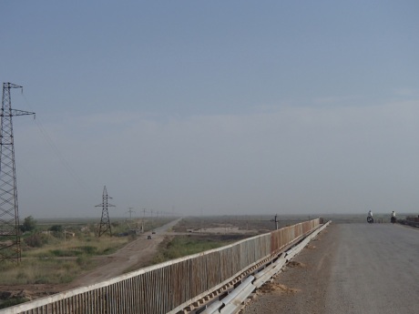 Depressing view of the long road ahead from a bridge of the Karakum Canal.